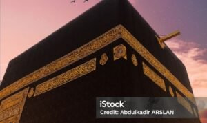The black building of the kaaba in mecca. Kaaba with moon. Mecca,Saudi Arabia.