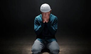 Muslim man praying in the mosque